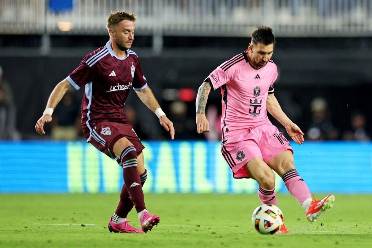 April, 2024; Fort Lauderdale, Florida, USA; Inter Miami CF forward Lionel Messi (10) moves the ball against Colorado Rapids defender Keegan Rosenberry (2) during the second half at Chase Stadium.