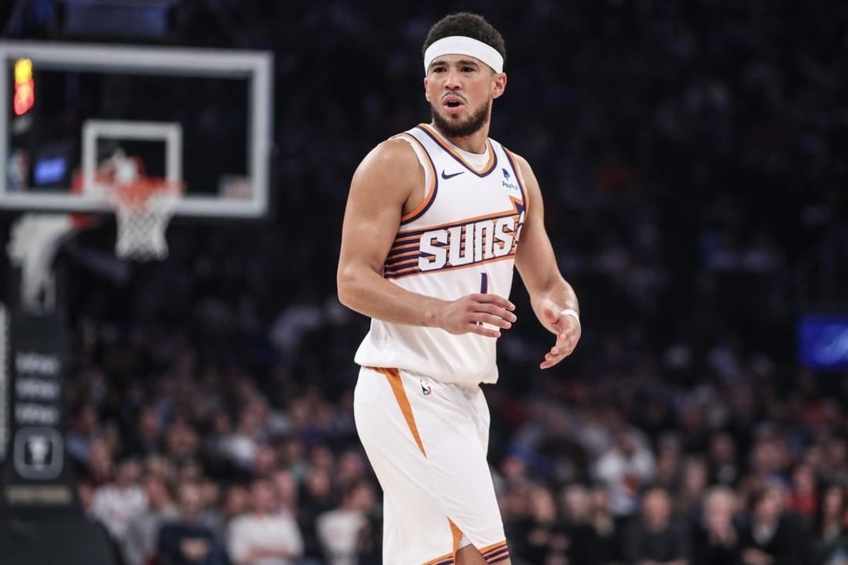 Nov 26, 2023; New York, New York, USA; Phoenix Suns guard Devin Booker (1) argues over a call in the first quarter against the New York Knicks at Madison Square Garden.