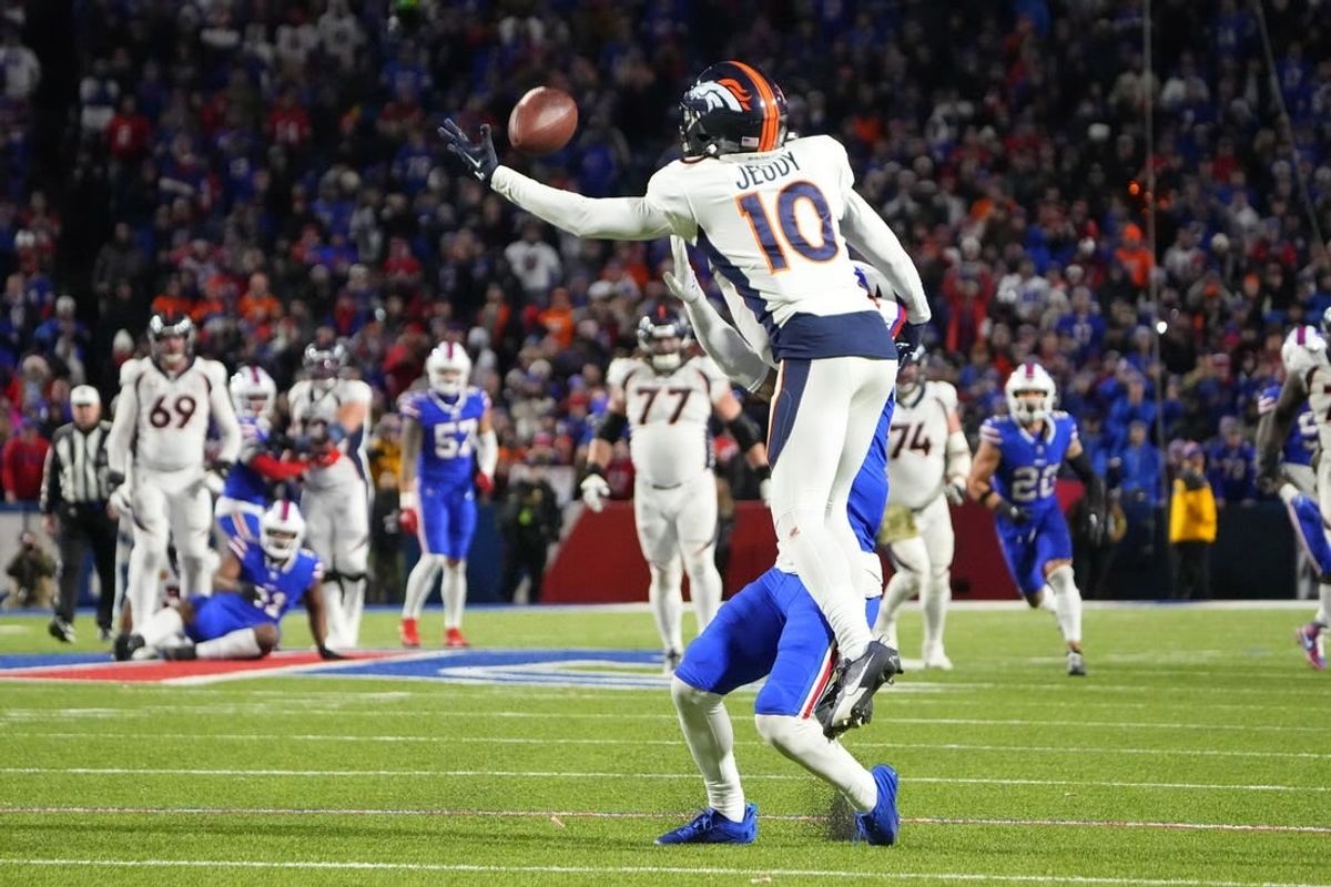 Nov 13, 2023; Orchard Park, New York, USA; Buffalo Bills cornerback Taron Johnson (7) pushes Denver Broncos wide receiver Jerry Jeudy (10) attempting to make a catch and is called for pass interference during the second half at Highmark Stadium.