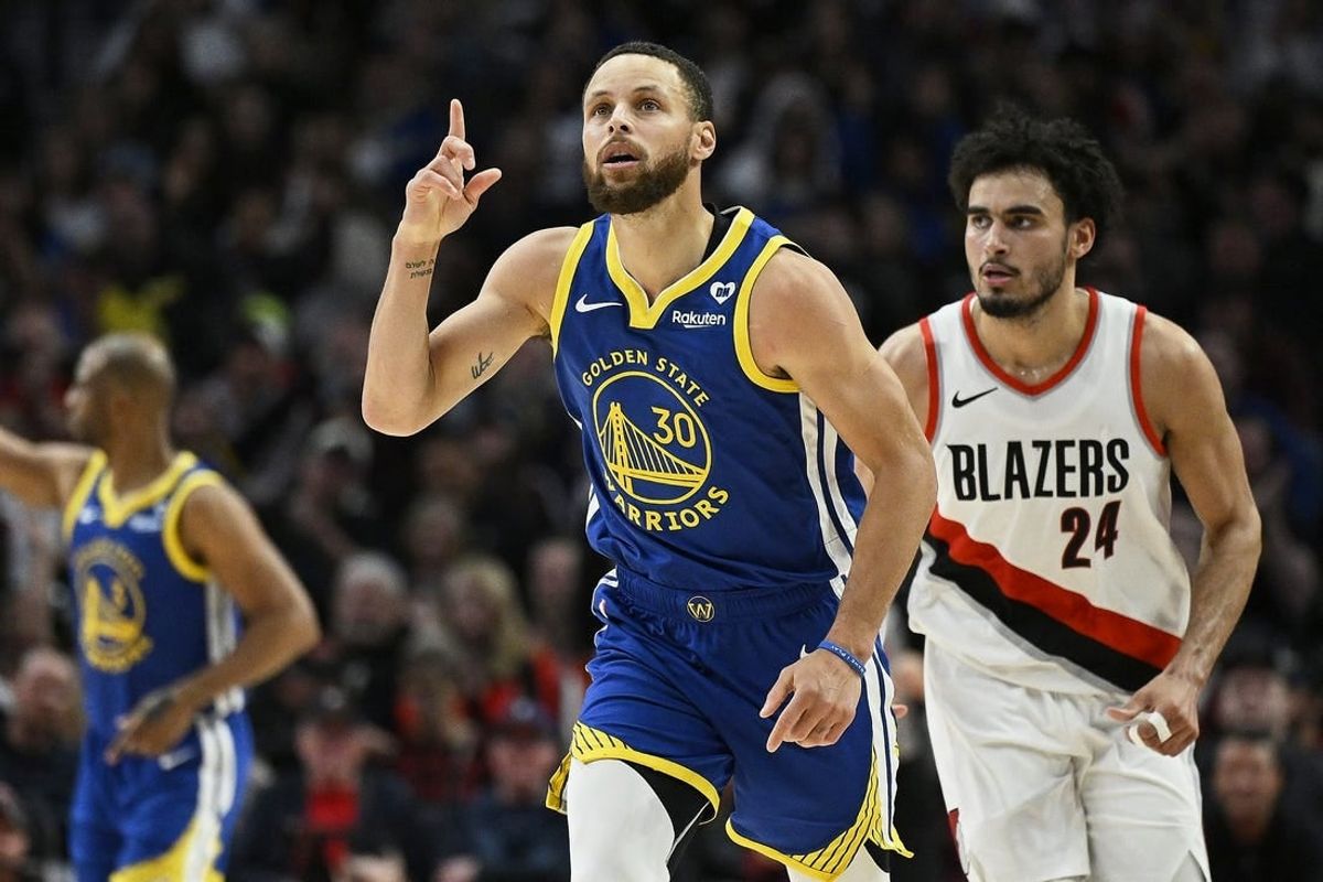 Apr 11, 2024; Portland, Oregon, USA; Golden State Warriors guard Stephen Curry (30) celebrates after a three point basket during the second half against Portland Trail Blazers forward Justin Minaya (24) at Moda Center.