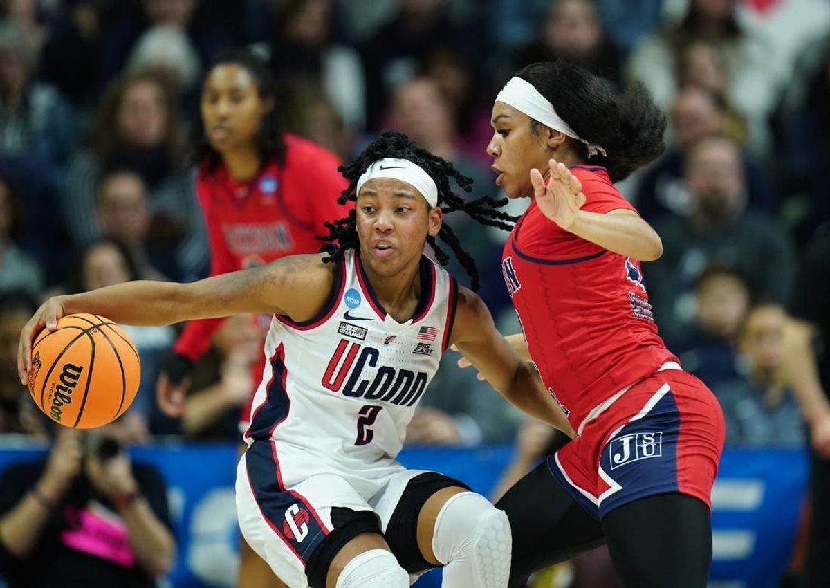 Mar 23, 2024; Storrs, Connecticut, USA; UConn Huskies guard KK Arnold (2) moves the ball against Jackson State Lady Tigers guard Zakiya Mahoney (22) in the second half at Harry A. Gampel Pavilion.