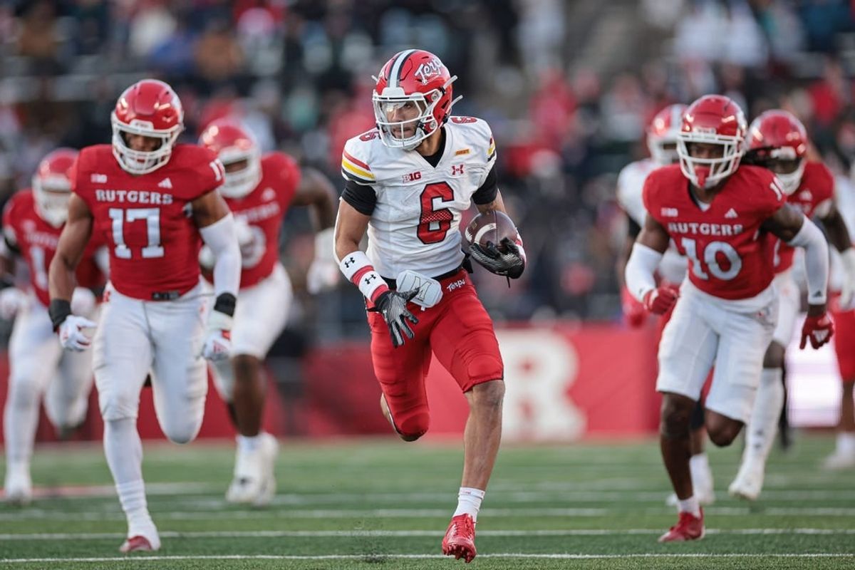 Nov 25, 2023; Piscataway, New Jersey, USA; Maryland Terrapins wide receiver Jeshaun Jones (6) gains yards after a catch during the first half as Rutgers Scarlet Knights linebacker Deion Jennings (17) and defensive back Flip Dixon (10) pursues at SHI Stadium.