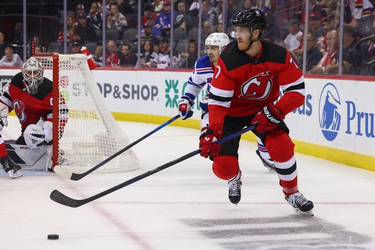 Oct 4, 2023; New York, New Jersey, USA; New Jersey Devils defenseman Dougie Hamilton (7) skates with the puck against the New York Rangers during the first period at Prudential Center.