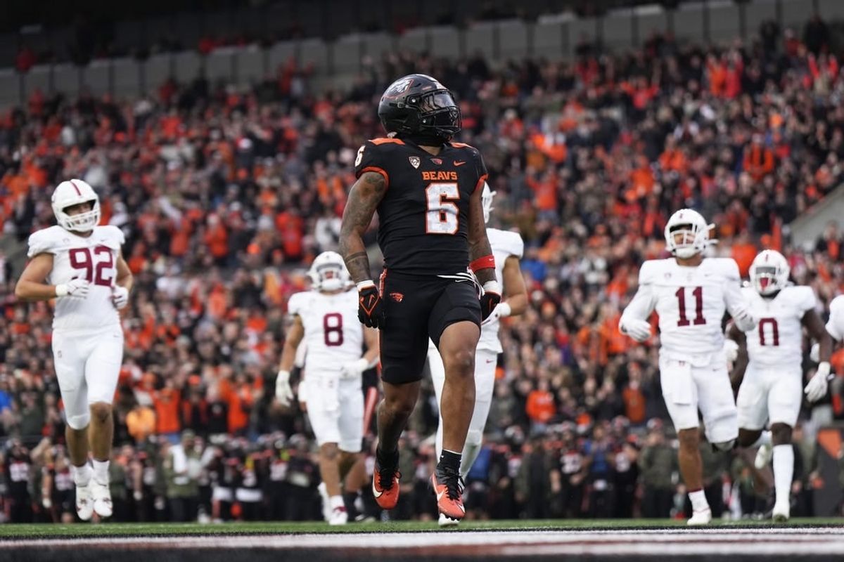 Nov 11, 2023; Corvallis, Oregon, USA; Oregon State Beavers running back Damien Martinez (6) runs with the ball for a touchdown during the first half against the Stanford Cardinal at Reser Stadium.