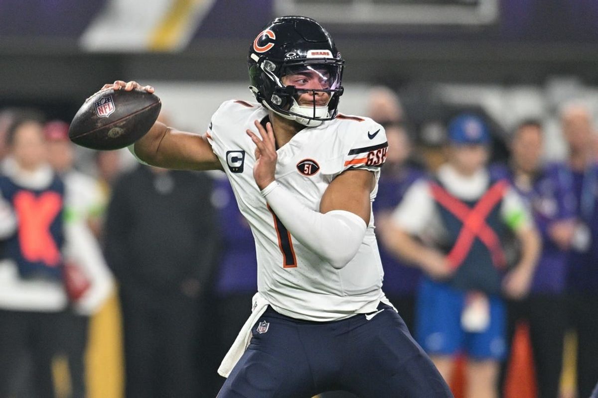 Nov 27, 2023; Minneapolis, Minnesota, USA; Chicago Bears quarterback Justin Fields (1) throws a pass during the game against the Minnesota Vikings at U.S. Bank Stadium.