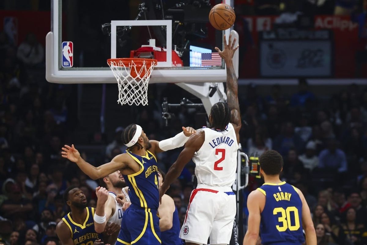 Dec 14, 2023; Los Angeles, California, USA; LA Clippers forward Kawhi Leonard (2) makes a layup during the first half of the game against the Golden State Warriors at Crypto.com Arena.