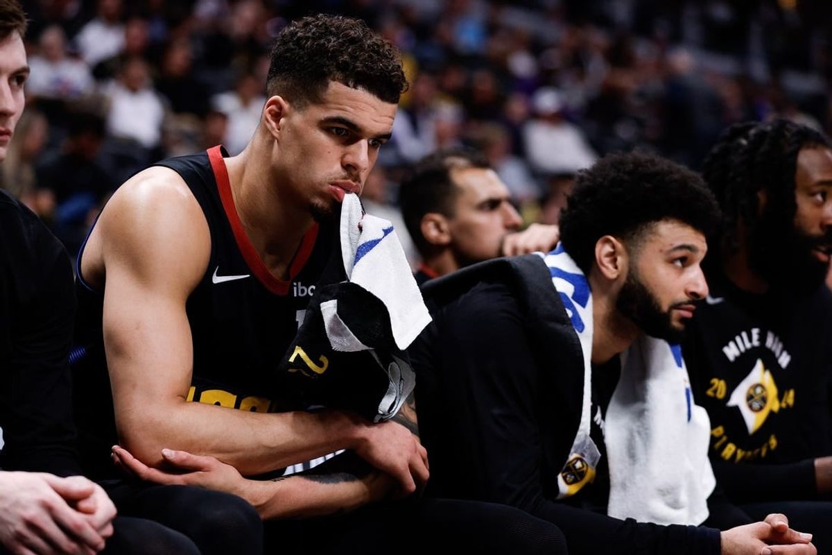 May 6, 2024; Denver, Colorado, USA; Denver Nuggets forward Michael Porter Jr. (1) and guard Jamal Murray (27) on the bench in the fourth quarter against the Minnesota Timberwolves during game two of the second round for the 2024 NBA playoffs at Ball Arena.