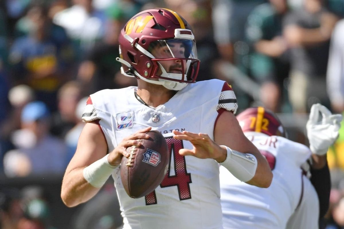 Oct 1, 2023; Philadelphia, Pennsylvania, USA; Washington Commanders quarterback Sam Howell (14) throws a pass against the Philadelphia Eagles during the second quarter at Lincoln Financial Field.