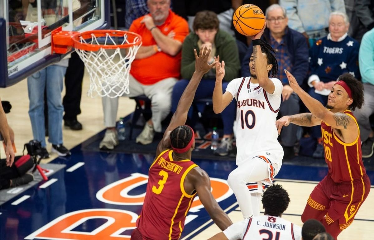Auburn Tigers player Chad Baker-Mazara (10) shoots a floater as Auburn Tigers take on USC Trojans at Neville Arena in Auburn, Ala., on Sunday, Dec. 17, 2023. Auburn Tigers defeated USC Trojans 91-75.