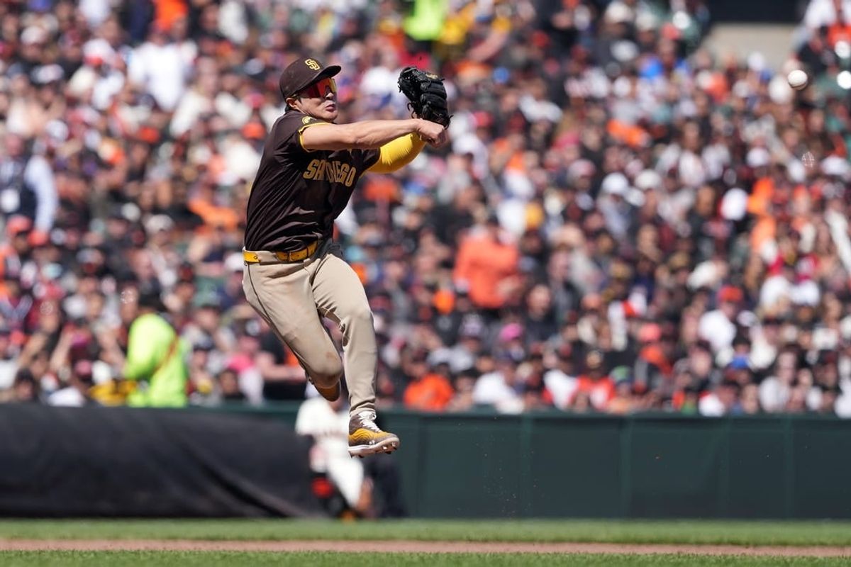 Apr 7, 2024; San Francisco, California, USA; San Diego Padres shortstop Ha-Seong Kim (7) throws the ball to second base to record an out against the San Francisco Giants during the sixth inning at Oracle Park.