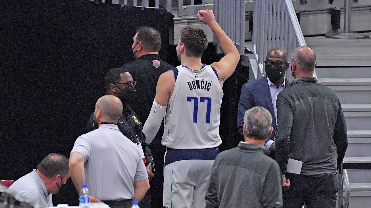 Luka Doncic waves to fans after being ejected from the game during the third quarter against the Cleveland Cavaliers at Rocket Mortgage Fieldhouse on Sunday.