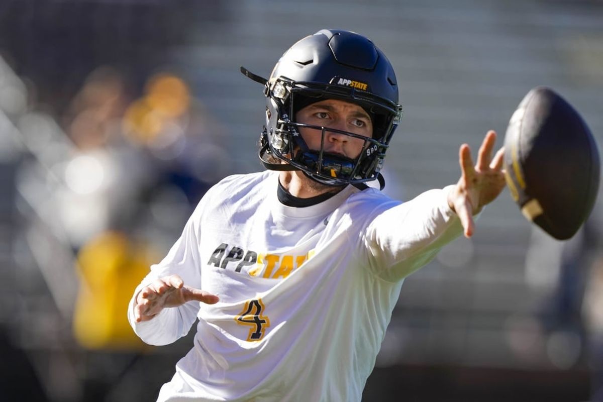 Sep 23, 2023; Laramie, Wyoming, USA; Appalachian State Mountaineers quarterback Joey Aguilar (4) warms up before game against the Wyoming Cowboys at Jonah Field at War Memorial Stadium.