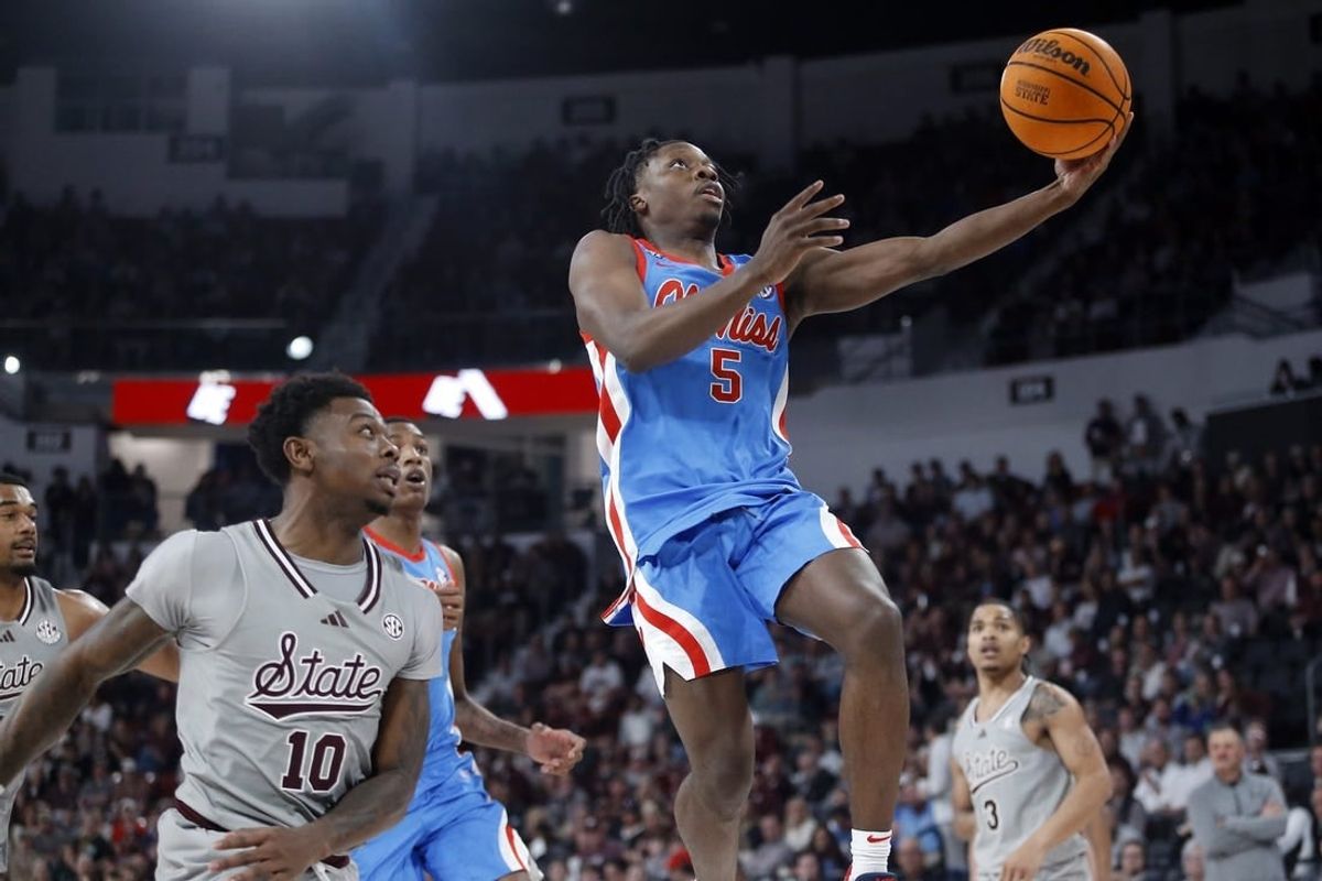 Feb 21, 2024; Starkville, Mississippi, USA; Mississippi Rebels guard Jaylen Murray (5) shoots during the first half against the Mississippi State Bulldogs at Humphrey Coliseum.