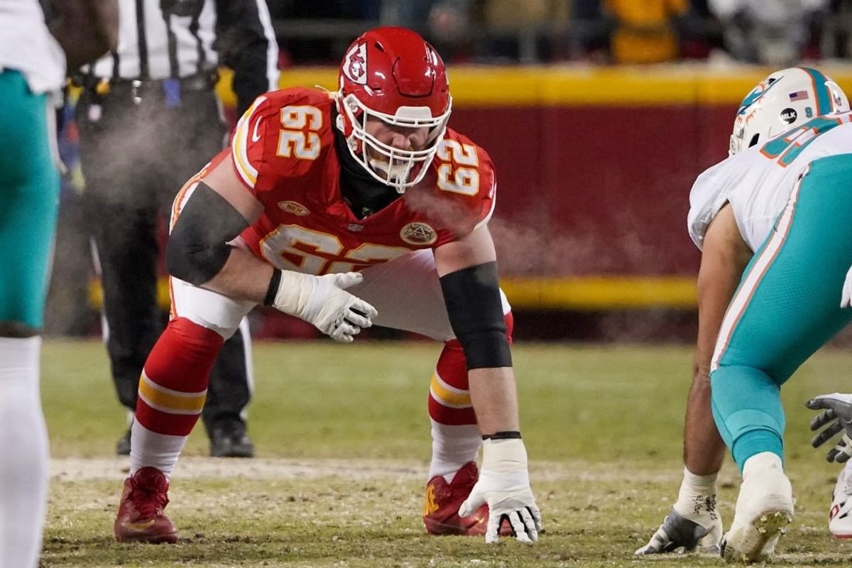 Jan 13, 2024; Kansas City, Missouri, USA; Kansas City Chiefs guard Joe Thuney (62) on the line of scrimmage against the Miami Dolphins in a 2024 AFC wild card game at GEHA Field at Arrowhead Stadium.