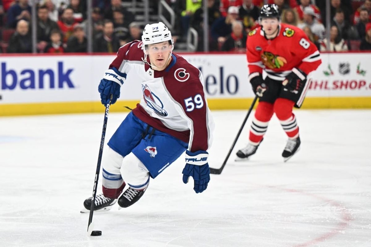 Dec 19, 2023; Chicago, Illinois, USA; Colorado Avalanche forward Ben Meyers (59) controls the puck in the first period against the Chicago Blackhawks at United Center.