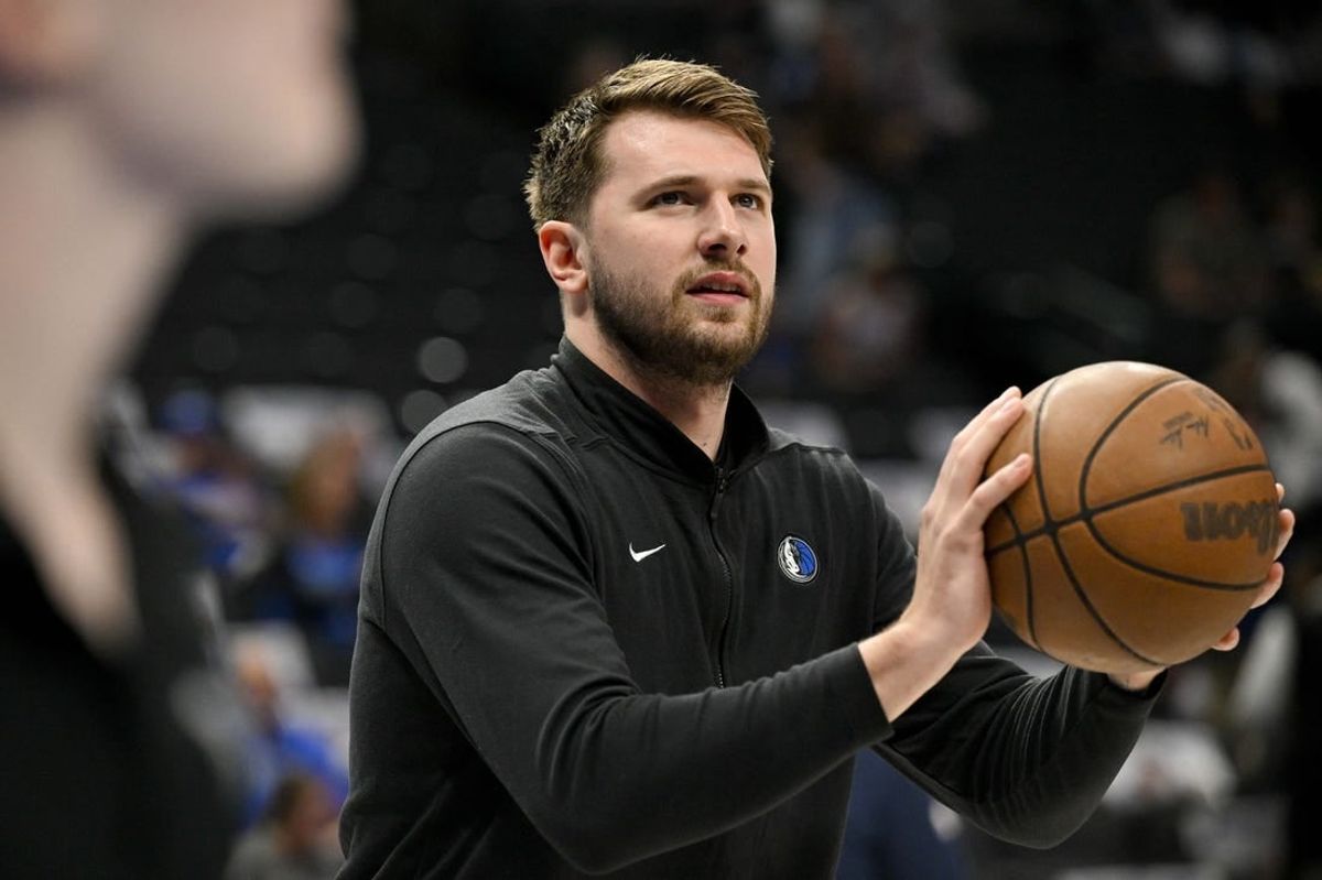 Mar 13, 2024; Dallas, Texas, USA; Dallas Mavericks guard Luka Doncic (77) warms up before the game between the Dallas Mavericks and the Golden State Warriors at the American Airlines Center.