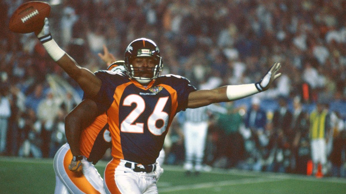 Tim McKyer celebrates after making a play against the Green Bay Packers in Super Bowl XXXI