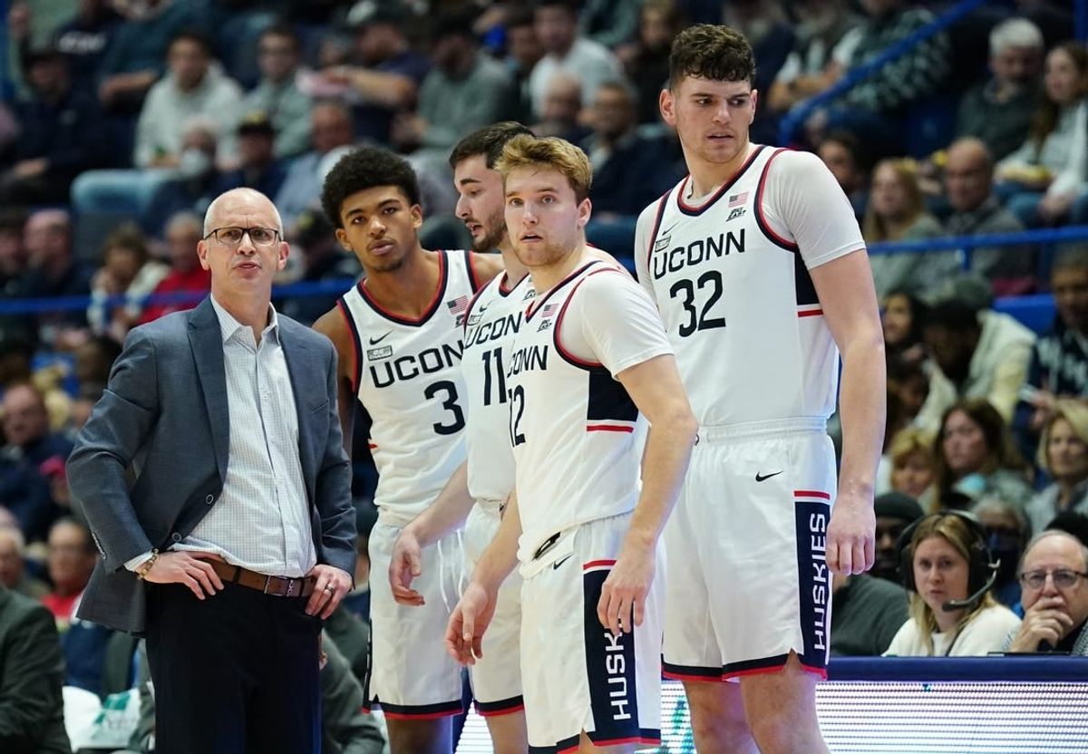 Nov 11, 2023; Hartford, Connecticut, USA; UConn Huskies head coach Dan Hurley talks with forward Jaylin Stewart (3), forward Alex Karaban (11), center Donovan Clingan (32) and guard Cam Spencer (12) from the sideline as they take on the Stonehill Skyhawks at XL Center.