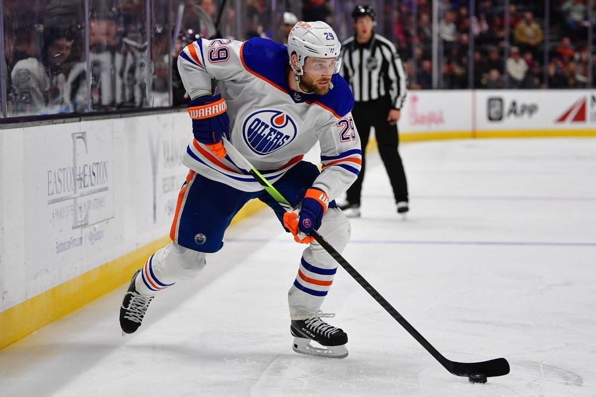 Dec 31, 2023; Anaheim, California, USA; Edmonton Oilers center Leon Draisaitl (29) moves the puck against the Anaheim Ducks during the third period at Honda Center.