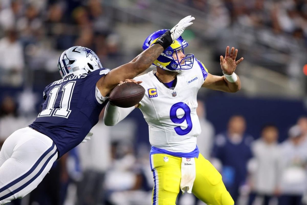 Oct 29, 2023; Arlington, Texas, USA; Dallas Cowboys linebacker Micah Parsons (11) attempts to sack Los Angeles Rams quarterback Matthew Stafford (9) in the second quarter at AT&T Stadium.