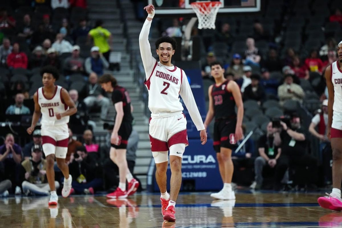 Mar 14, 2024; Las Vegas, NV, USA; Washington State Cougars guard Myles Rice (2) celebrates in the first half against the Stanford Cardinal at T-Mobile Arena.