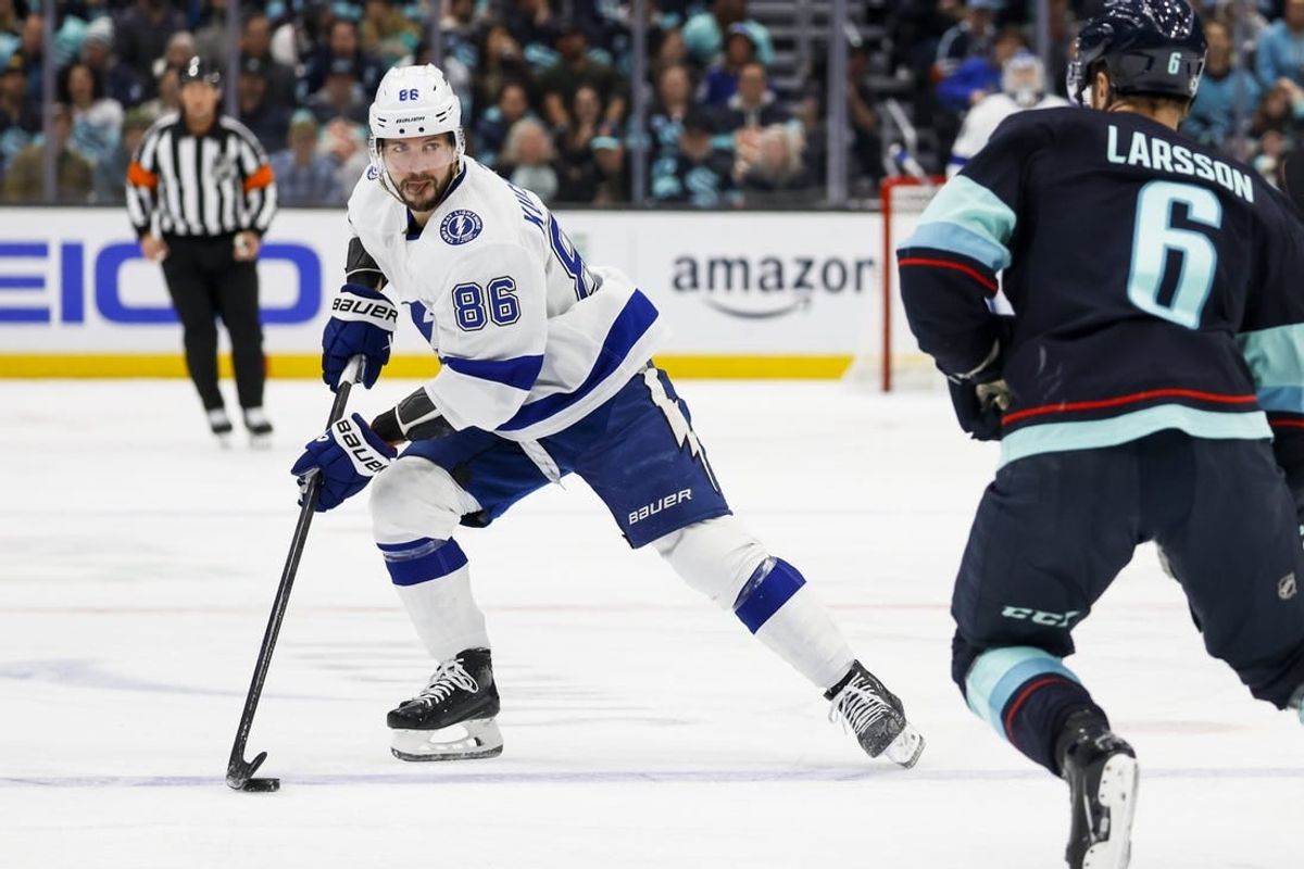 Dec 9, 2023; Seattle, Washington, USA; Tampa Bay Lightning right wing Nikita Kucherov (86) skates with the puck against the Seattle Kraken during the first period at Climate Pledge Arena.