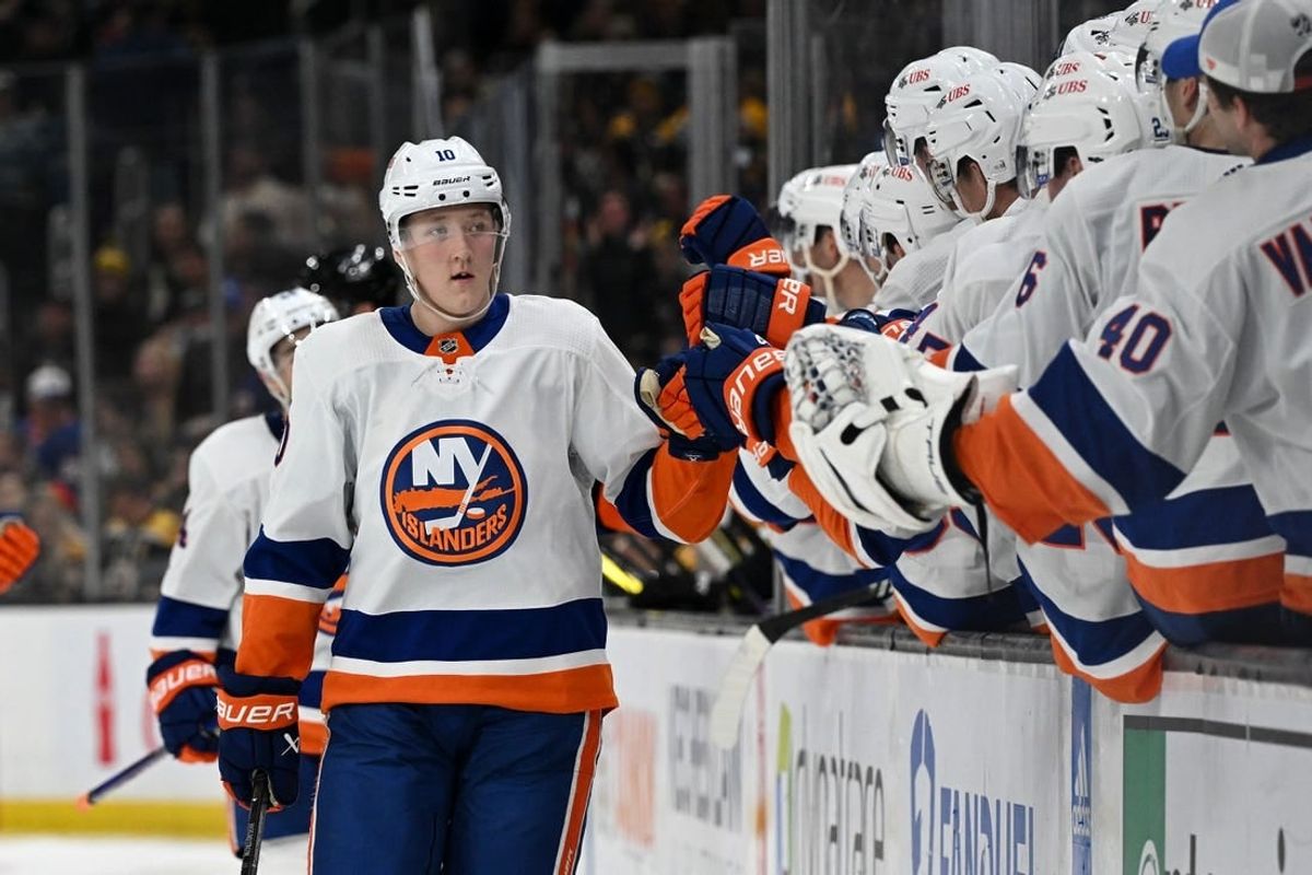 Nov 9, 2023; Boston, Massachusetts, USA; New York Islanders right wing Simon Holmstrom (10) celebrates with his teammates after scoring a goal against the Boston Bruins during the third period at the TD Garden.