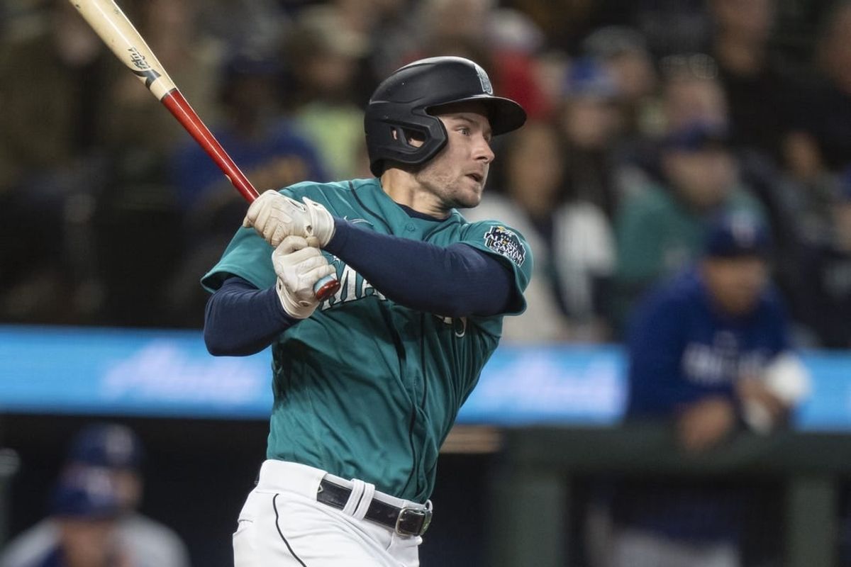 Sep 30, 2023; Seattle, Washington, USA; Seattle Mariners pinch hitter Jarred Kelenic (10) hits a single during the sixth inning against the Texas Rangers at T-Mobile Park.