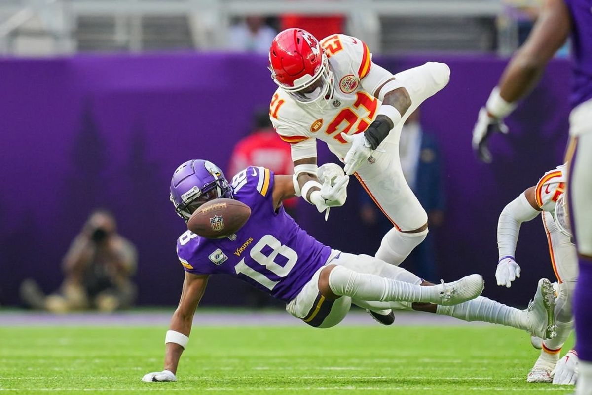 Oct 8, 2023; Minneapolis, Minnesota, USA; Kansas City Chiefs safety Mike Edwards (21) breaks up a pass to Minnesota Vikings wide receiver Justin Jefferson (18) in the third quarter at U.S. Bank Stadium.
