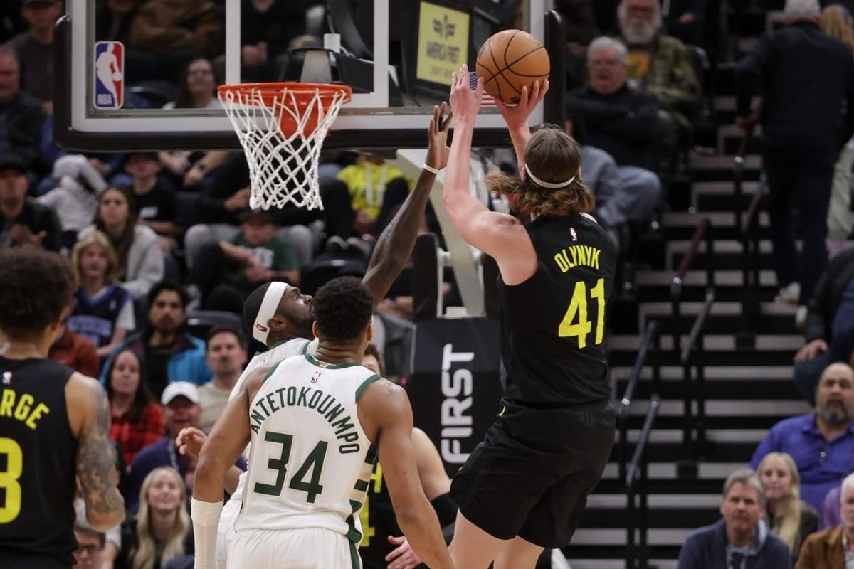 Feb 4, 2024; Salt Lake City, Utah, USA;  Utah Jazz forward Kelly Olynyk (41) shoots the ball during the second half against the Milwaukee Bucks at Delta Center.