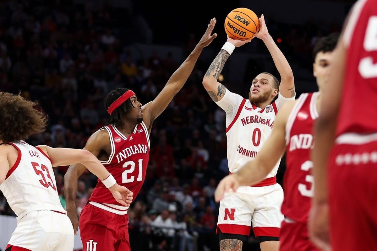 Mar 15, 2024; Minneapolis, MN, USA; Nebraska Cornhuskers guard C.J. Wilcher (0) shoots as Indiana Hoosiers forward Mackenzie Mgbako (21) defends during the first half at Target Center.