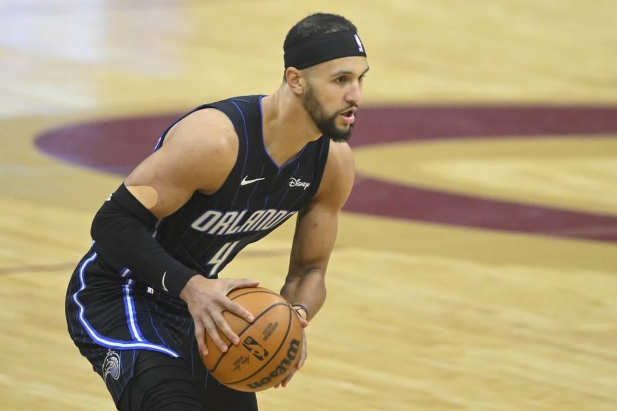 Apr 22, 2024; Cleveland, Ohio, USA; Orlando Magic guard Jalen Suggs (4) looks to pass in the first quarter against the Cleveland Cavaliers during game two of the first round of the 2024 NBA playoffs at Rocket Mortgage FieldHouse.