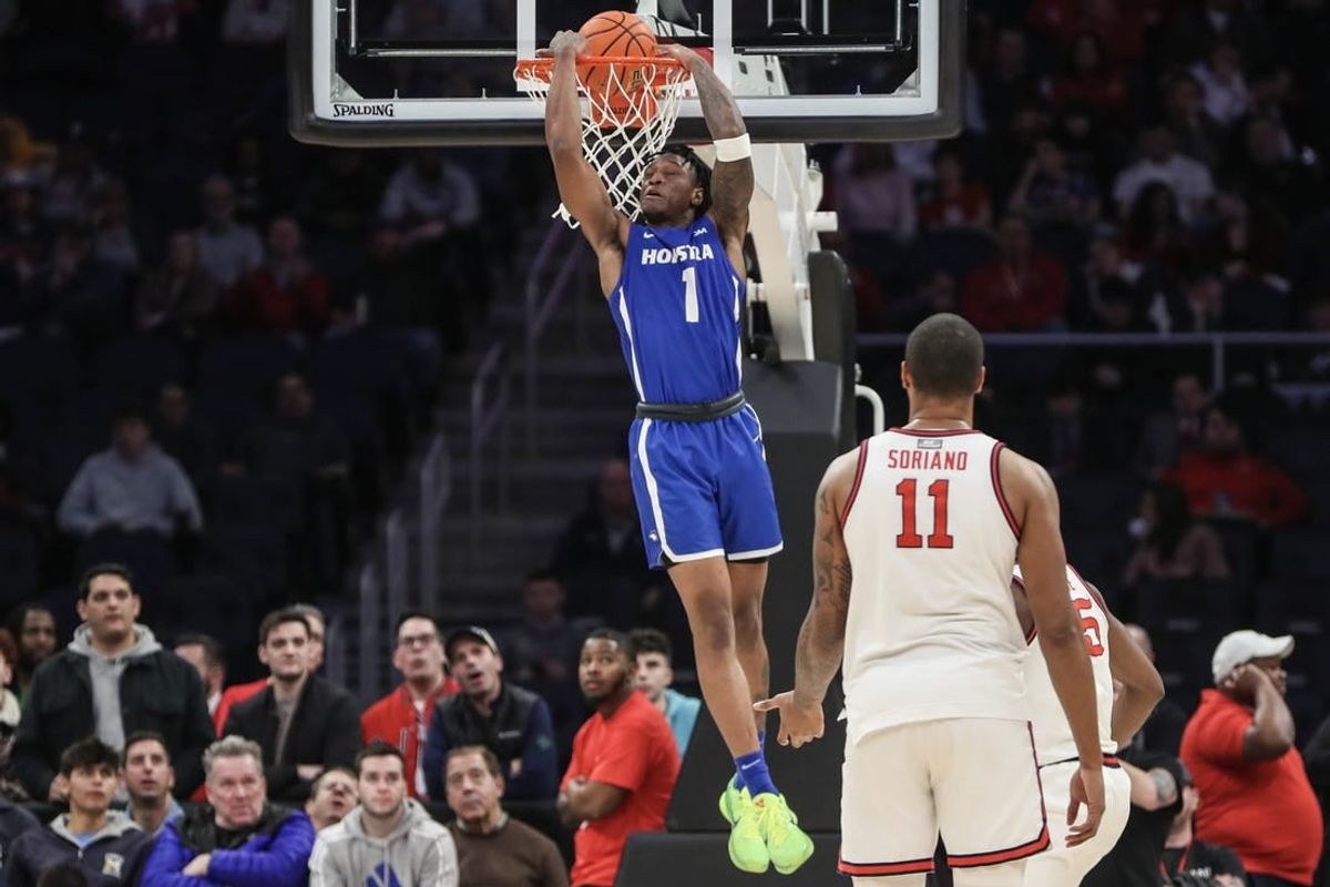 Dec 30, 2023; Elmont, New York, USA;  Hofstra Pride guard Darlinstone Dubar (1) dunks in the second half against the St. John's Red Storm at UBS Arena.
