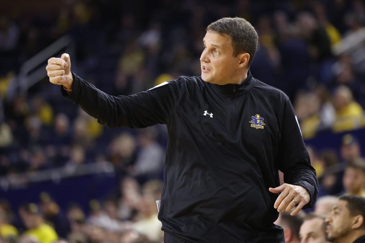 Dec 29, 2023; Ann Arbor, Michigan, USA;  McNeese State Cowboys head coach Will Wade coaches during the first half against the Michigan Wolverines at Crisler Center.
