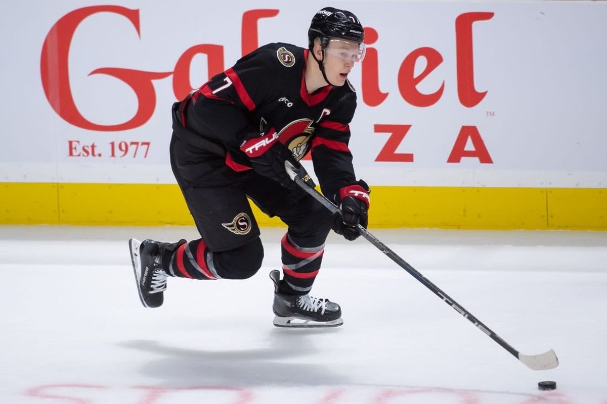 Jan 29, 2024; Ottawa, Ontario, CAN; Ottawa Senators left wing Brady Tkachuk (7) skates with the puck in overtime against the Nashville Predators at the Canadian Tire Centre.