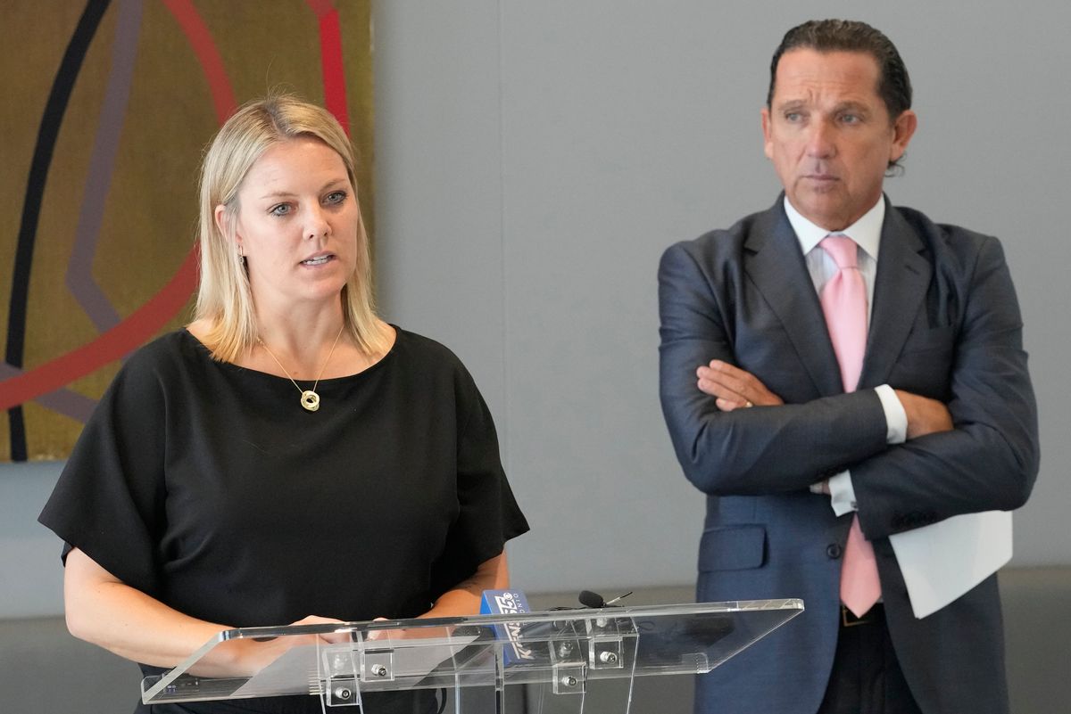 Former Spurs team psychologist Hillary Cauthen (left), with attorney Tony Buzbee