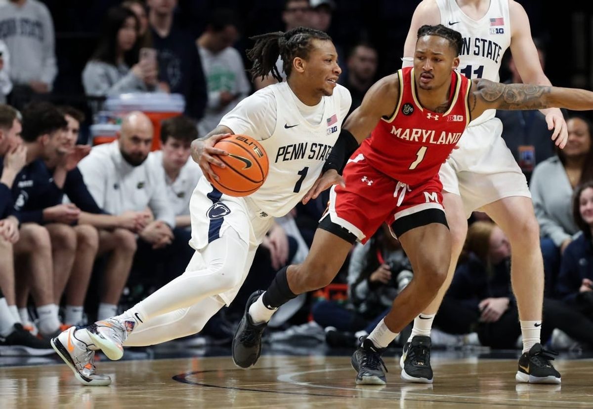 Mar 10, 2024; University Park, Pennsylvania, USA; Penn State Nittany Lions guard Ace Baldwin Jr (1) dribbles the ball toward the basket as Maryland Terrapins guard Jahmir Young (1) defends during the second half at Bryce Jordan Center. Penn State defeated Maryland 85-69.