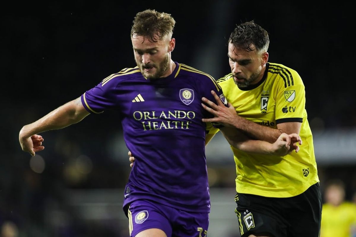 Nov 25, 2023; Orlando, Florida, USA; Orlando City forward Duncan McGuire (13) and Columbus Crew defender Rudy Camacho (4) battle for the ball during the second half in a MLS Cup Eastern Conference Semifinal match at Exploria Stadium.