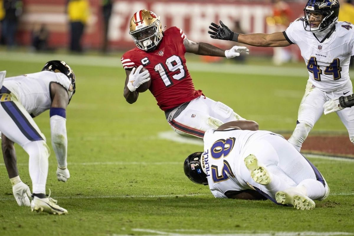 Dec 25, 2023; Santa Clara, California, USA; San Francisco 49ers wide receiver Deebo Samuel (19) is tackled by Baltimore Ravens defensive tackle Michael Pierce (58) during the fourth quarter at Levi's Stadium.
