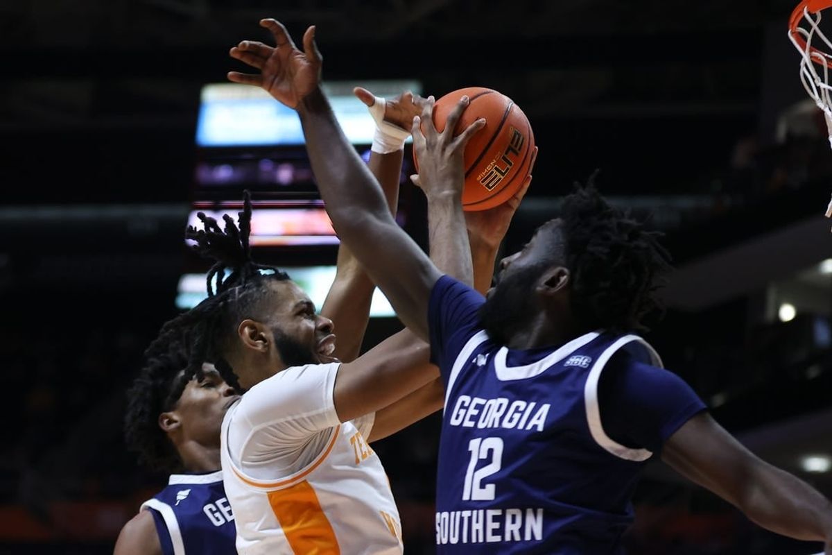 Dec 12, 2023; Knoxville, Tennessee, USA; Tennessee Volunteers forward Jonas Aidoo (0) goes to the basket against Georgia Southern Eagles guard Tyren Moore (12) at Food City Center at Thompson-Boling Arena.