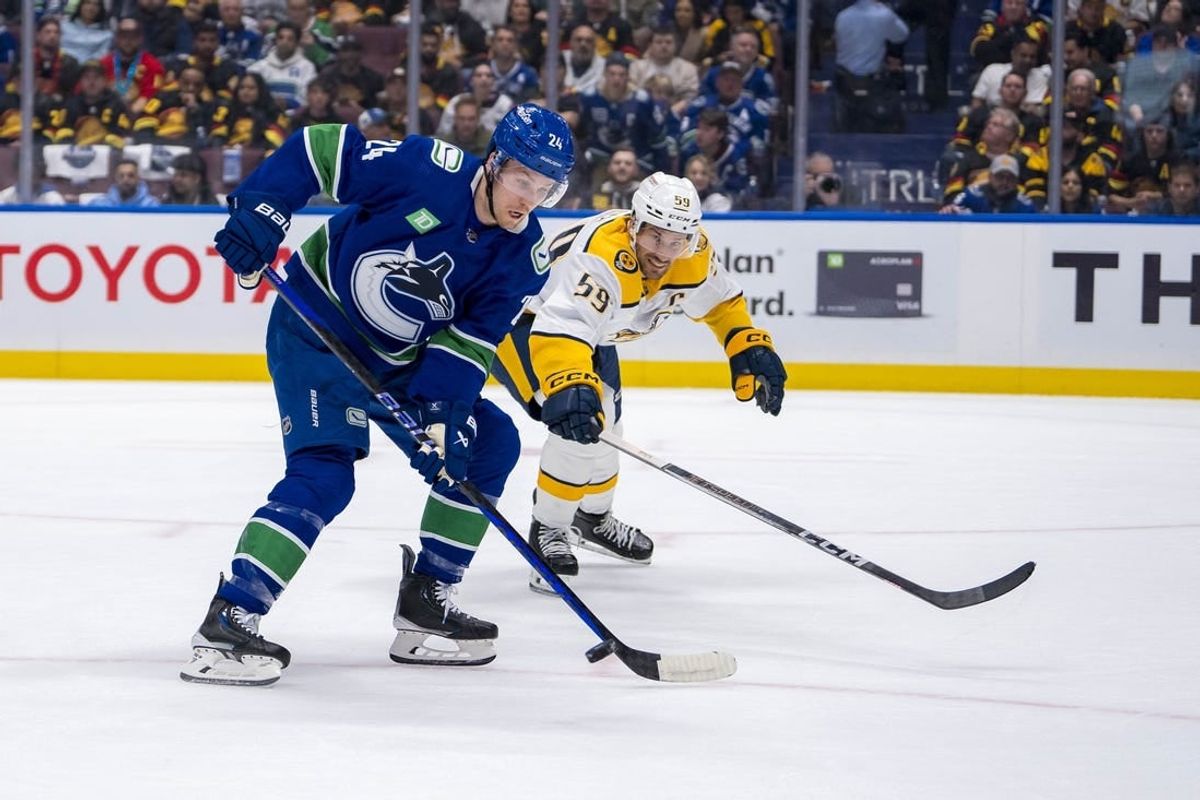 Apr 21, 2024; Vancouver, British Columbia, CAN; Nashville Predators defenseman Roman Josi (59) stick checks Vancouver Canucks forward Pius Suter (24) in the first period in game one of the first round of the 2024 Stanley Cup Playoffs at Rogers Arena.
