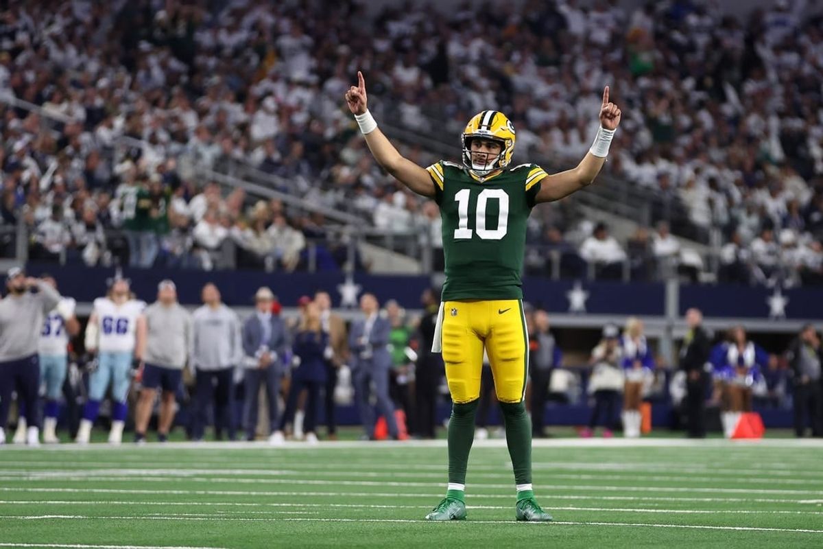 Jan 14, 2024; Arlington, Texas, USA; Green Bay Packers quarterback Jordan Love (10) reacts after a touchdown against the Dallas Cowboys during the second half of the  2024 NFC wild card game at AT&T Stadium.