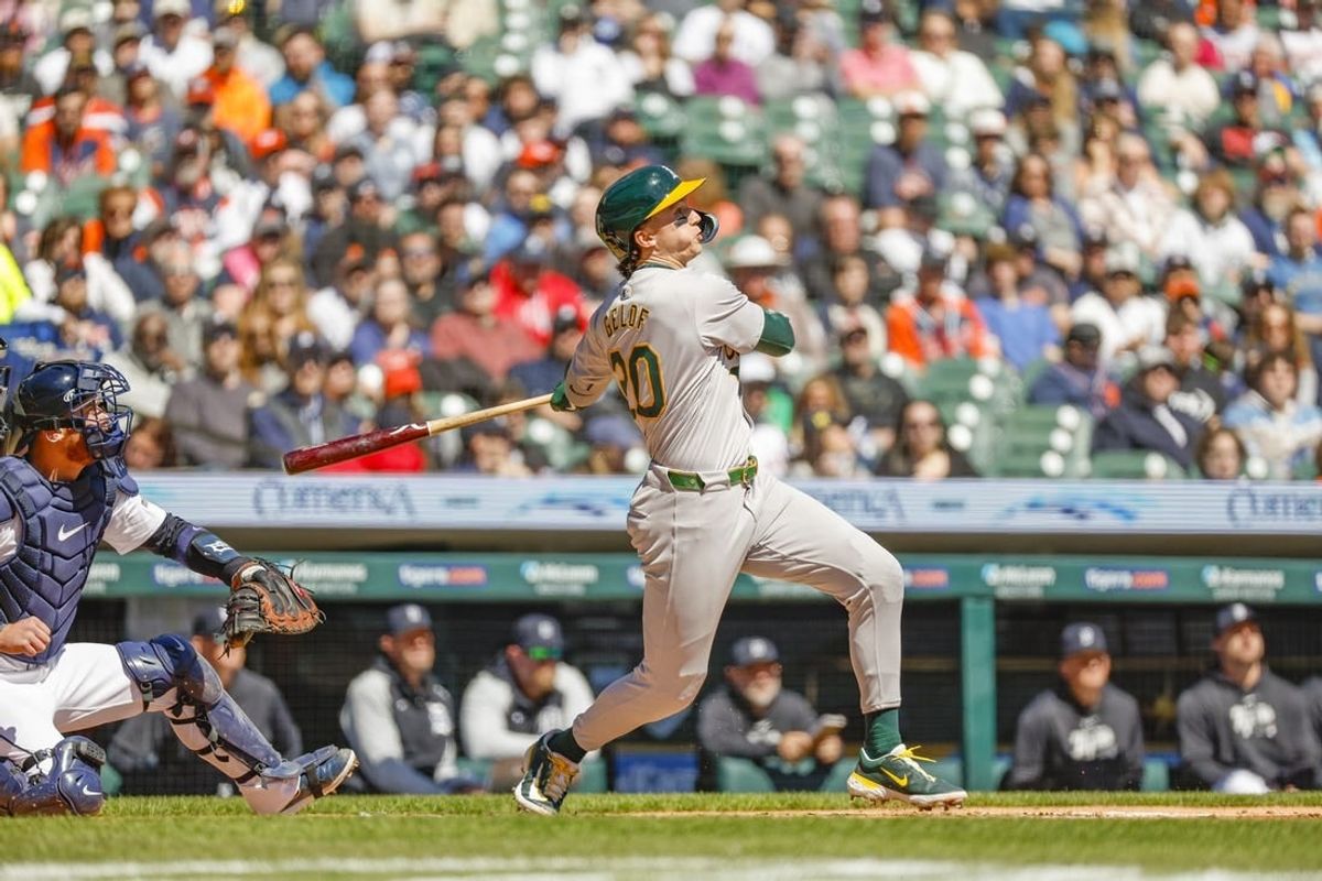 Apr 7, 2024; Detroit, Michigan, USA; Oakland Athletics second baseman Zack Gelof (20) hits a home run during the second inning of the game against the Detroit Tigers at Comerica Park.