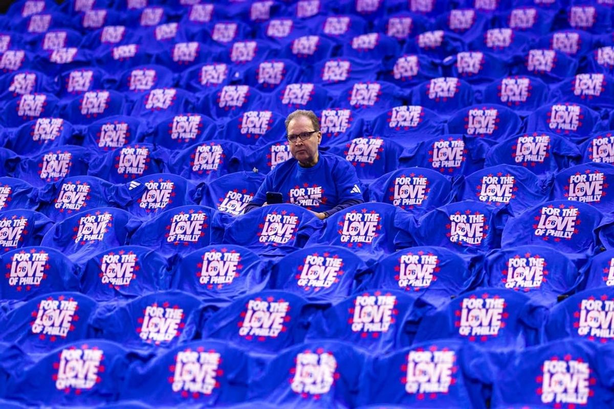 Apr 17, 2024; Philadelphia, Pennsylvania, USA; A fan looks on before a game between the Philadelphia 76ers and the Miami Heat in a play-in game of the 2024 NBA playoffs at Wells Fargo Center.