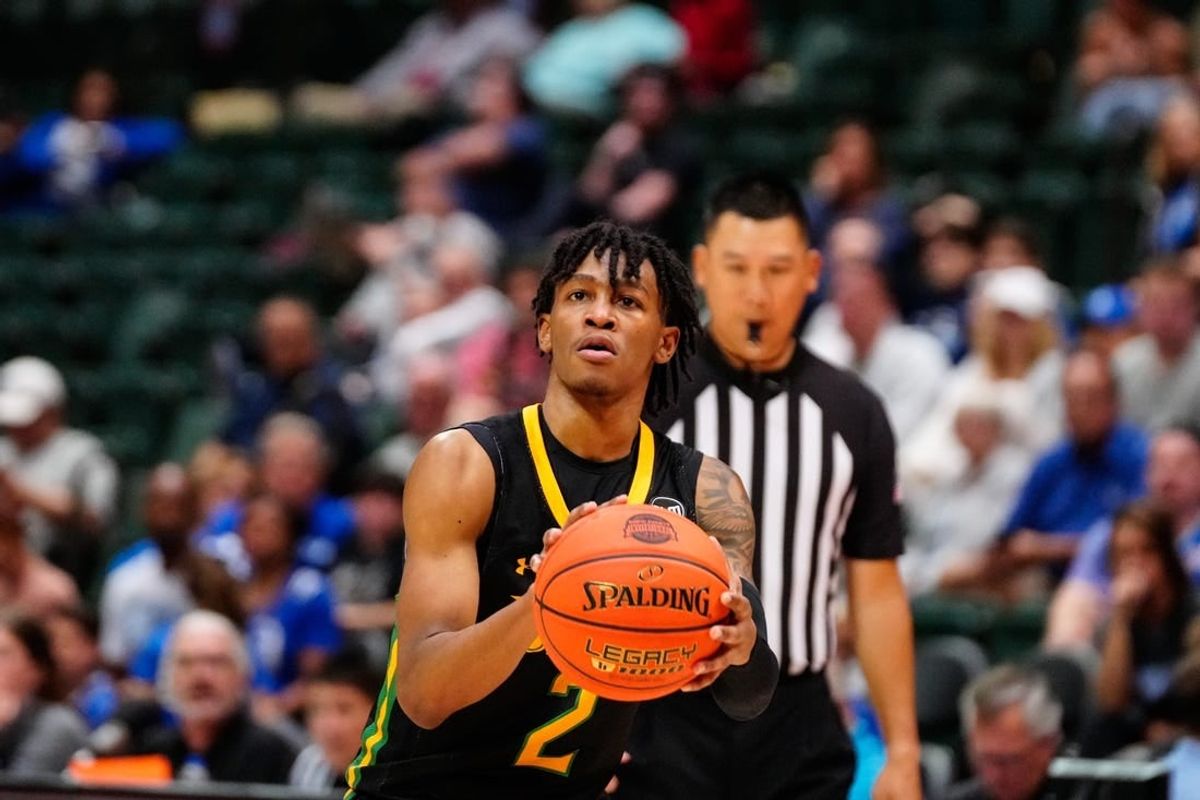 Nov 27, 2022; Orlando, FL, USA; Siena Saints guard Javian McCollum (2) shoots against the Seton Hall Pirates during the second half at ESPN Wide World of Sports.