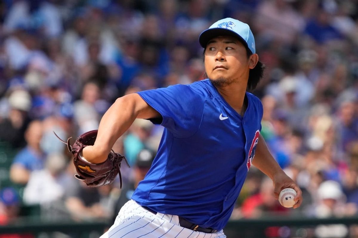 Mar 14, 2024; Mesa, Arizona, USA; Chicago Cubs starting pitcher Shota Imanaga (18) throws against the Oakland Athletics in the second inning at Sloan Park.