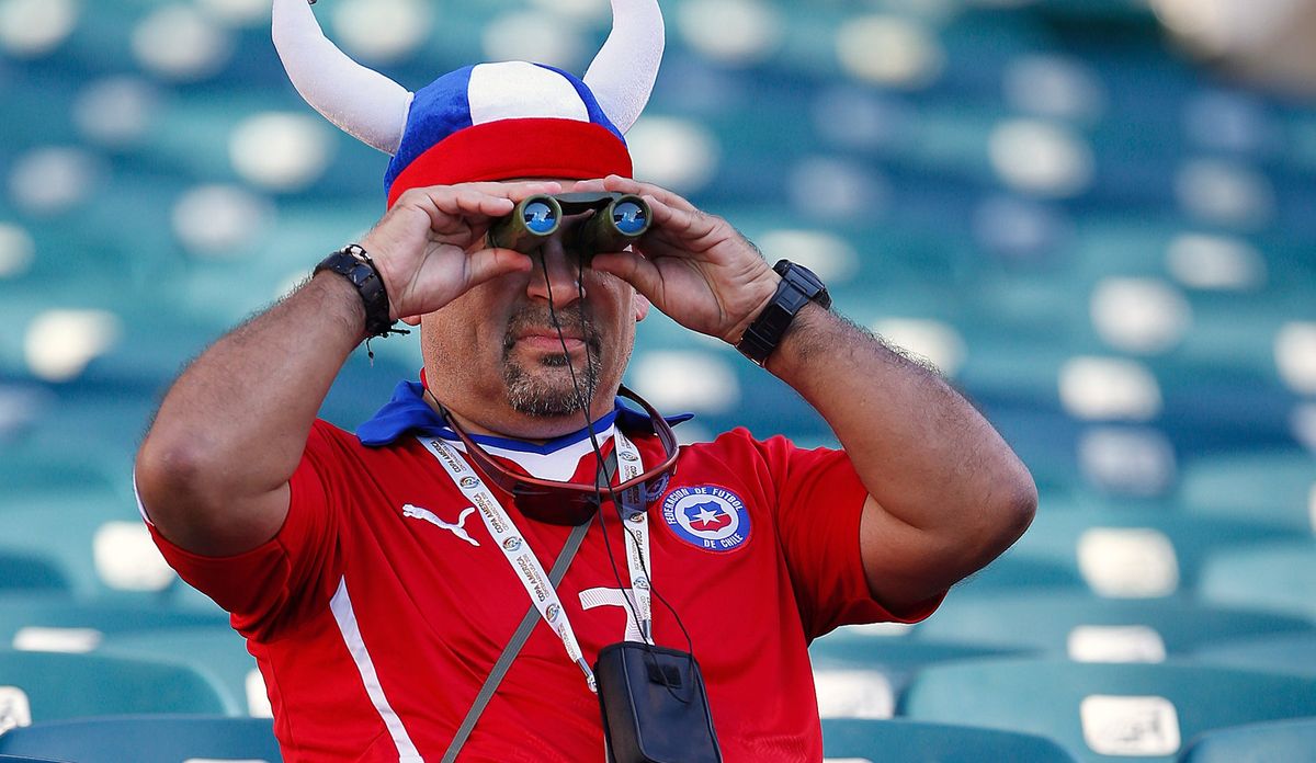 A Chile fan searches for competent defense; Photo via  [object Object]