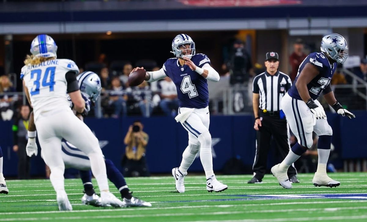 Dec 30, 2023; Arlington, Texas, USA;  Dallas Cowboys quarterback Dak Prescott (4) looks to throw during the first half against the Detroit Lions at AT&T Stadium.