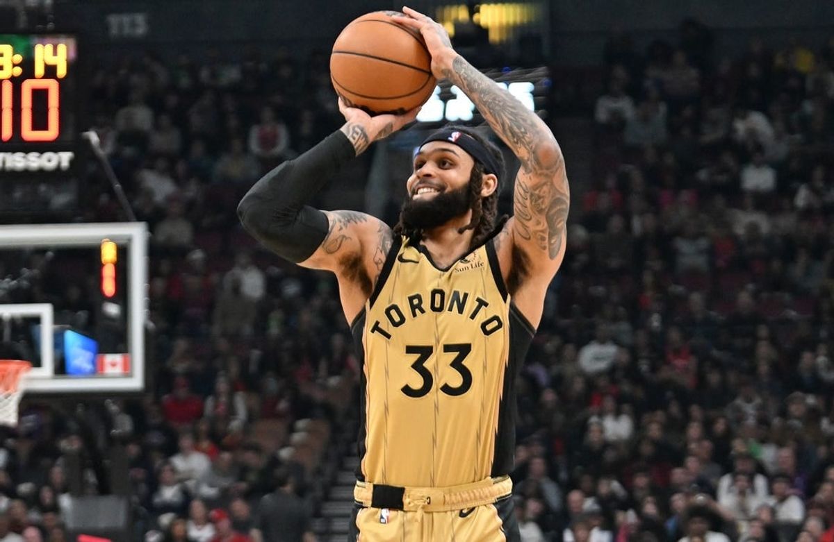 Feb 22, 2024; Toronto, Ontario, CAN;  Toronto Raptors guard Gary Trent Jr. (33) shoots the ball against the Brooklyn Nets in the first half at Scotiabank Arena.