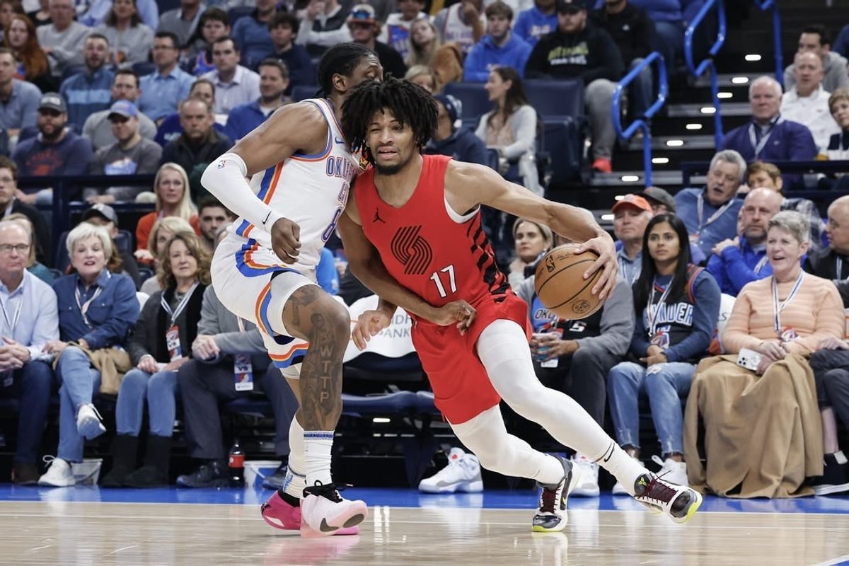 Jan 11, 2024; Oklahoma City, Oklahoma, USA; Portland Trail Blazers guard Shaedon Sharpe (17) drives around Oklahoma City Thunder forward Jalen Williams (8) during the second quarter at Paycom Center.